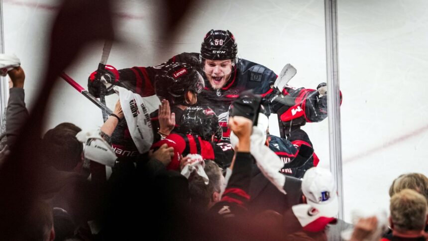 Huracanes Dominan a Capitals: Walker y Svechnikov Impulsan la Victoria