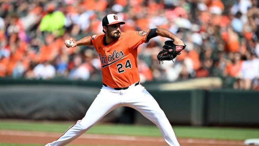 Eflin, Lanzador de los Orioles, Abandona Juego por Molestias en la Espalda