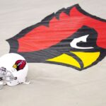 Cardinals: J.J. Russell Hospitalizado Tras Choque en Entrenamiento
