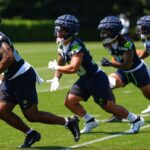 Seahawks: Kenny McIntosh Sufre Lesión ACL, Baja en el Roster y Retornos