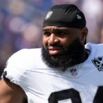 Wilkins y Raiders: Beso Polémico y Despido Tras Fractura en el Pie