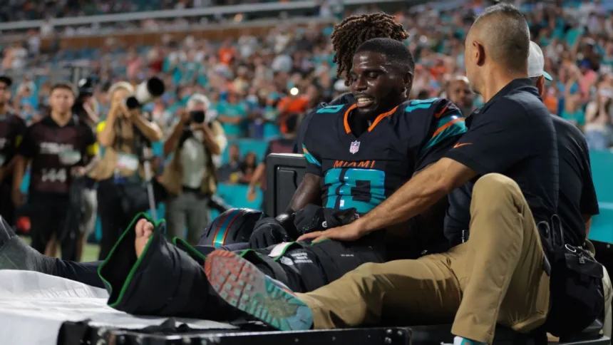 Tyreek Hill: Lesión de Rodilla, Futuro en NFL y Impacto en Dolphins