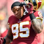 Payne, DT de Commanders, expulsado tras agredir a St. Brown de Lions