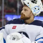 Brossoit de Blackhawks a la AHL: Regreso a la acción tras lesión.