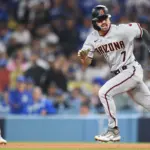 Carroll Regresa: Debut sin Hits con los Dbacks tras Lesión en la Mano