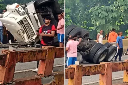 Dos heridos tras vuelco de camión en el puente del río Maimón