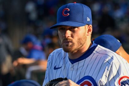 Cubs place Happ on IL; prospect Ballesteros called up