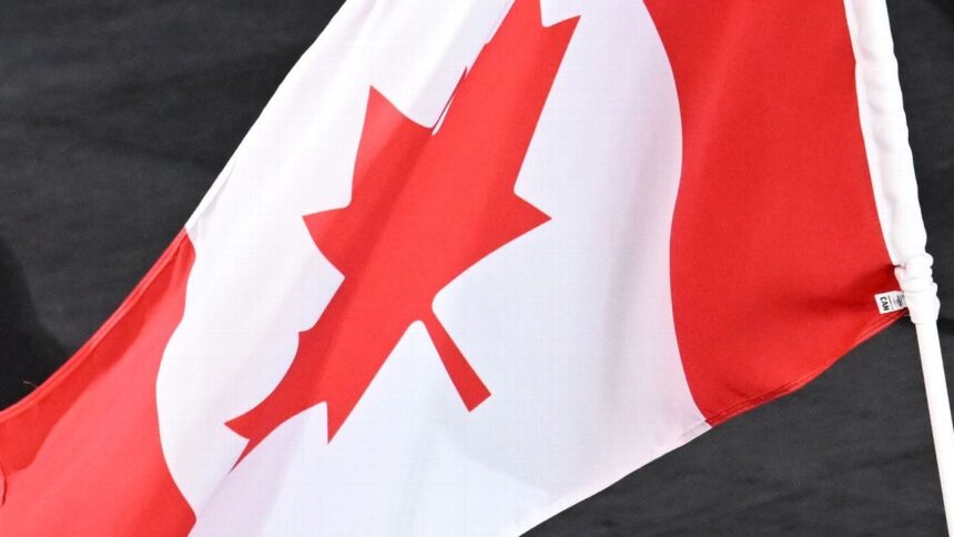 MacKinnon Shines: Canadian's Double in Victory Over Austria