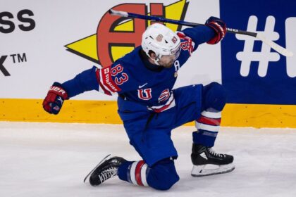 U.S. Advances to World Hockey Semifinals: Garland Shines Against Finland