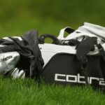 Homa, without a caddie, carries his bag and battles in US Open qualifying