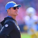 Jim Harbaugh advises John: Watch out for foul balls in baseball!