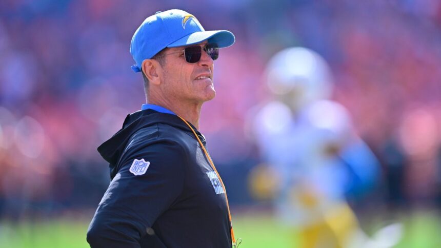 Jim Harbaugh advises John: Watch out for foul balls in baseball!