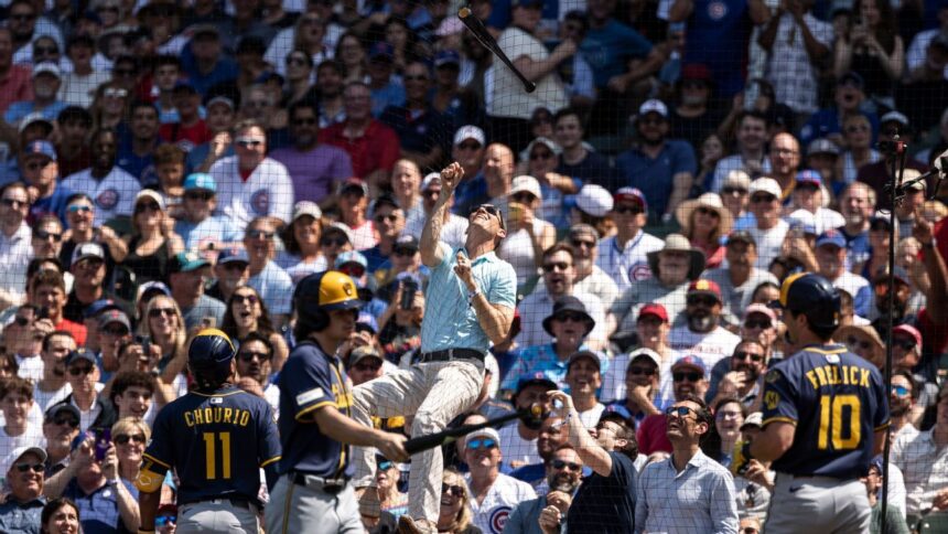 Fan scales Wrigley Field net for Sal Frelick's bat: Viral