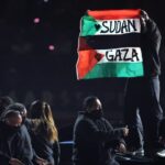 SB LIX Dancer Arrested After Flag Protest: Details and Reactions