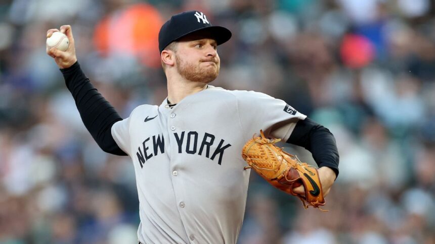 Schmidt leaves game with forearm discomfort: Yankees concerned
