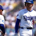 Dodgers' Freeman hit on wrist: Exits game