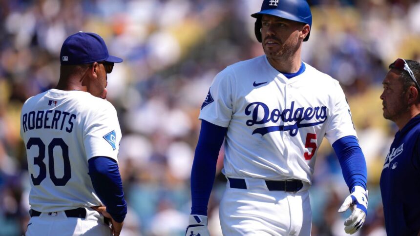 Dodgers' Freeman hit on wrist: Exits game