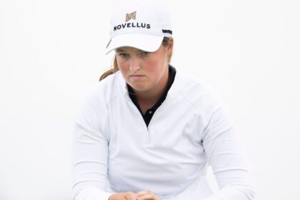 Lottie Woad leads the Women's Scottish Open in her professional debut