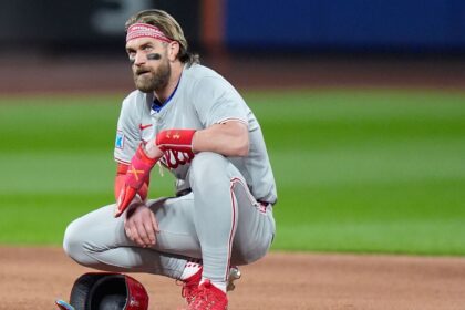 Harper vs. Manfred: Strong Clash Over Salary Cap in Phillies Meeting