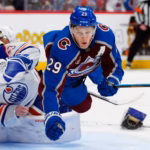 Avalanche Furious: MacKinnon Ejected for Contact with Goalie, Fair?